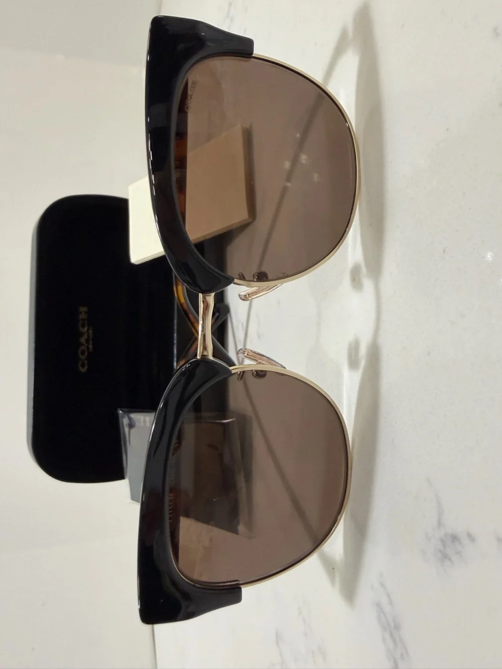 Coach Black Frame Sunglasses with Gold Trim and Brown Lenses